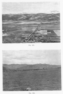 Fig. 121&mdash;Looking north from the hill near Anta in the
Anta basin north of Cuzco. Typical composition of slopes and intermont
basins in the Central Andes. Alluvial fill in the foreground; mature
slopes in the background; in the extreme background the snow-capped
crests of the Cordillera Vilcapampa.
